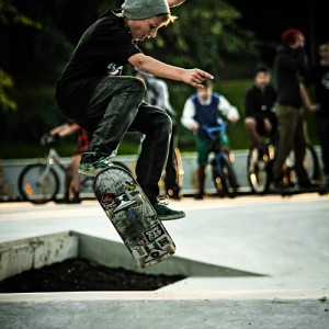 Skate boarder jumping – board flipping