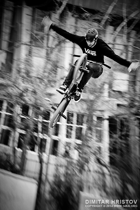 BMX biker flying jump photography other extreme black and white  Photo