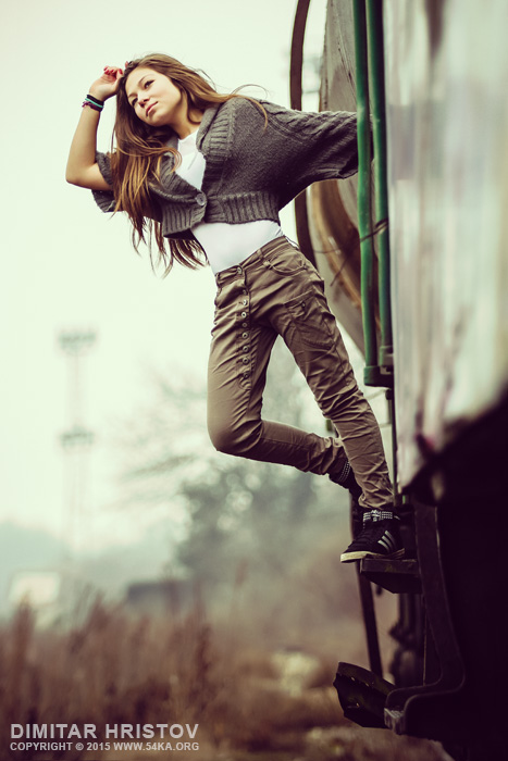 Woman posing at the old train   fashion portrait photography portraits featured fashion  Photo