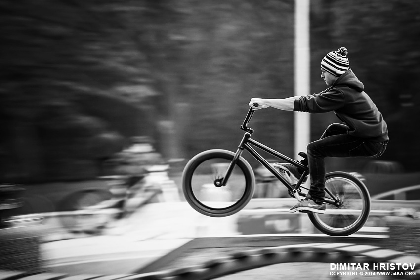 Young man riding BMX bicycle on a ramp photography other extreme black and white  Photo