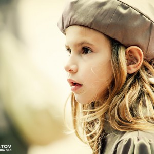 Portrait of a cute little girl with hat