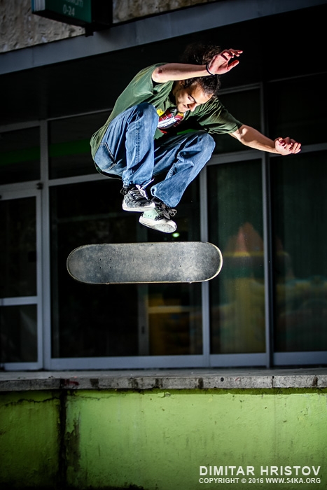 Skate boarder jump   board flipping photography extreme  Photo