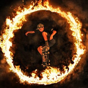 Skateboard jump in the Fire ring