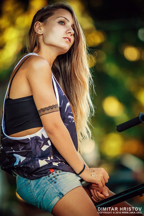 Young woman posing on the BMX bicycle photography portraits  Photo