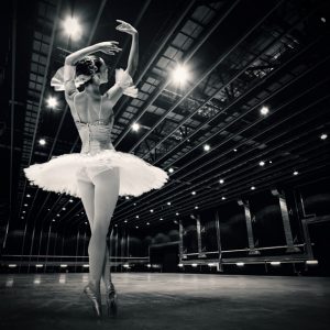 A beautiful ballerina dancing in studio
