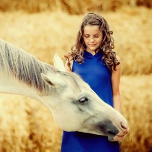 Happy girl with horse