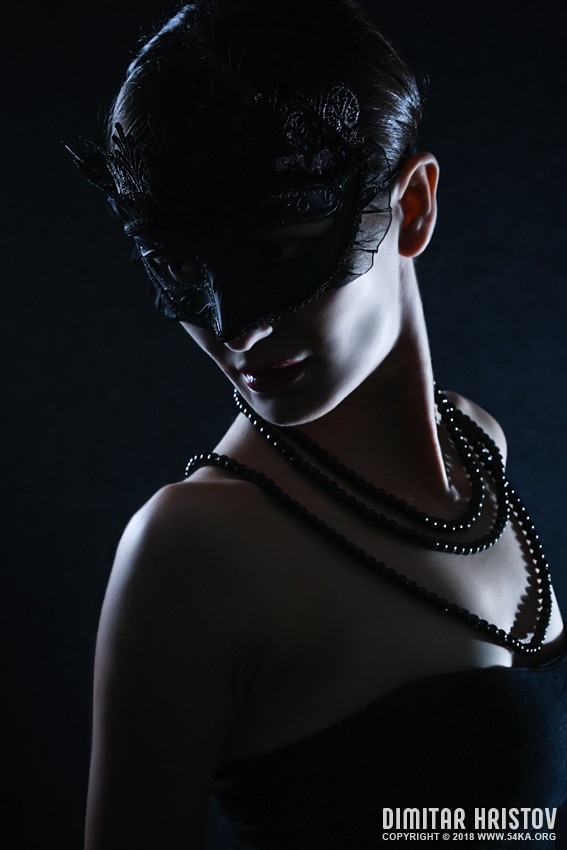 Elegant Beautiful Girl in black mask   Masquerade photography venetian eye mask fashion  Photo