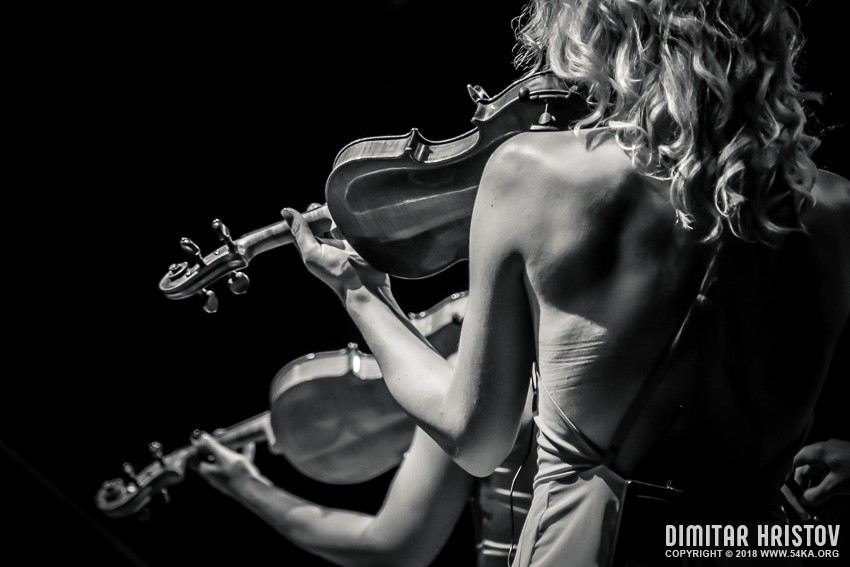 Beautiful girl playing violin photography stage black and white  Photo