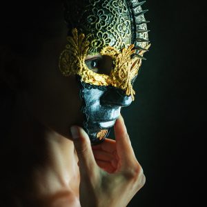 A mysterious woman with a full mask