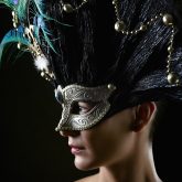 Girl with masquerade mask princess peacock feathers party mask