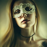 Glamour woman with venetian masquerade carnival mask