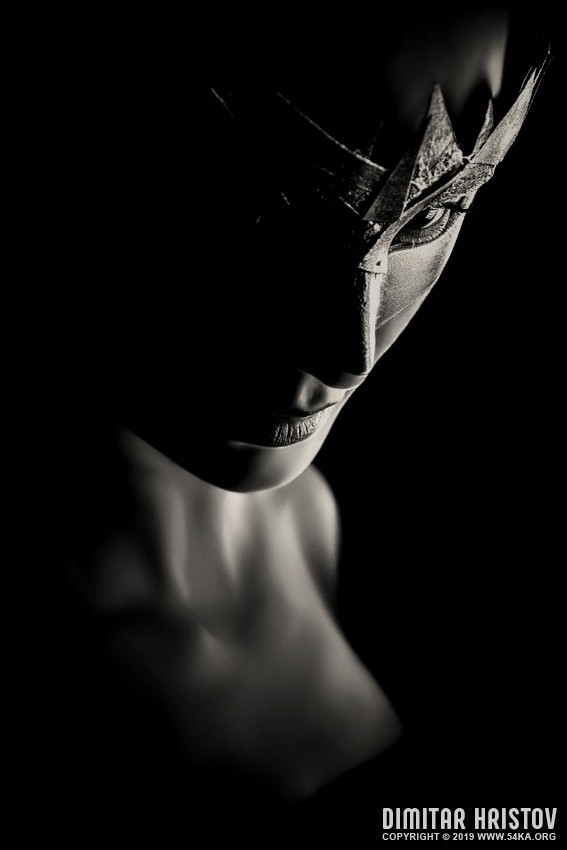 Low key portrait photography of a girl with Venetian mask photography venetian eye mask portraits featured fashion black and white  Photo