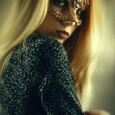 Portrait of woman with beautiful masquerade mask