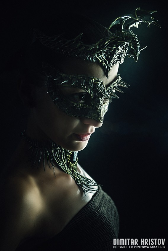 Dragon beauty   Closeup studio portrait photography venetian eye mask fashion  Photo