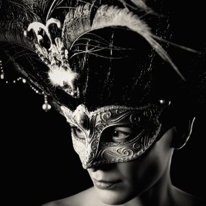Glamour young woman with Venice mask – Studio portrait