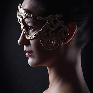 Portrait of attractive sensual young woman with mask