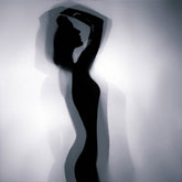 Silhouette of a girl in beautiful pose – Backlight photography