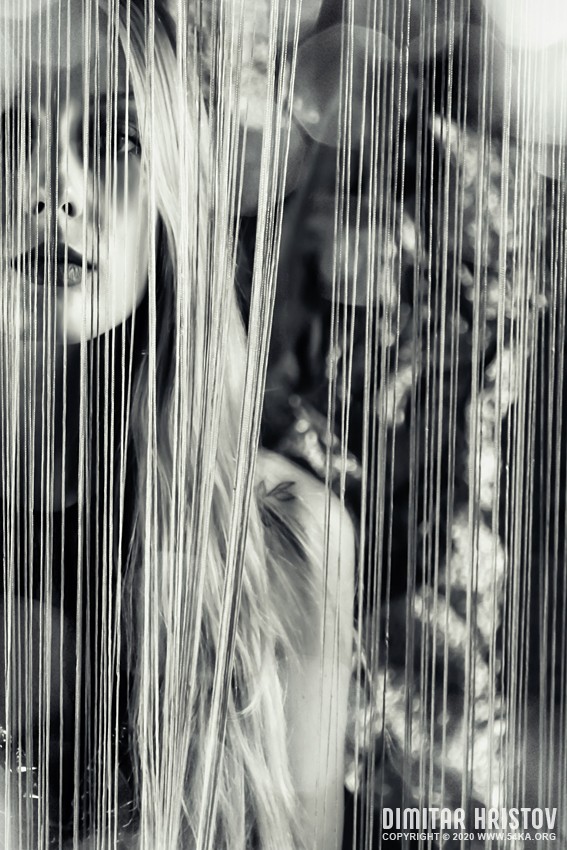 Beautiful sensual woman stands by the curtain photography portraits daily dose black and white  Photo