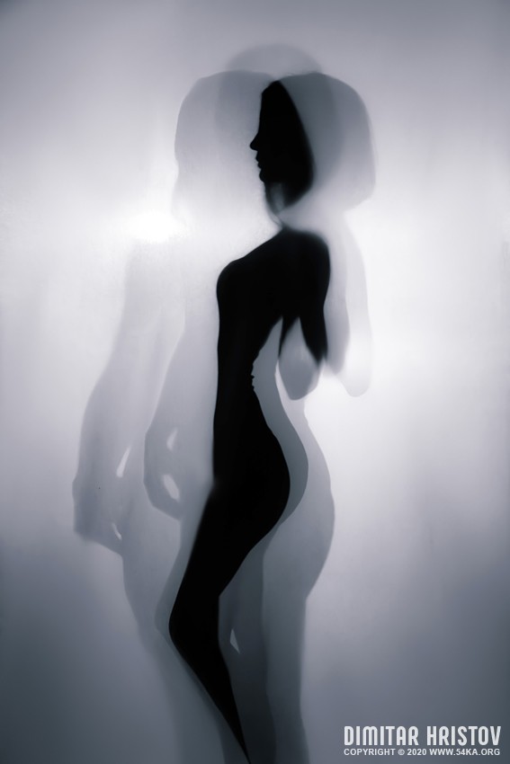 Silhouette of young woman on white background – Studio Art Photography