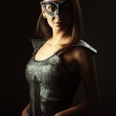 Portrait of a girl with dark mask II